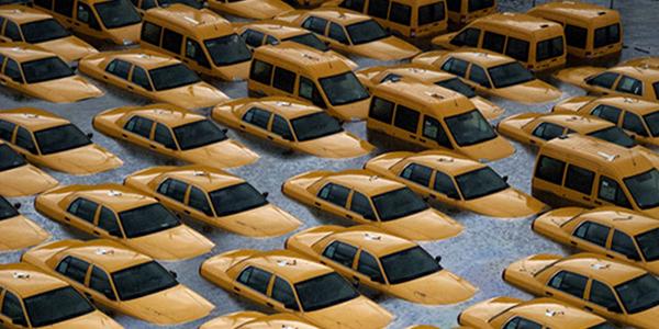 Taxis sit in a flooded lot after Hurricane Sandy October 30, 2012 in Hoboken, New Jersey. (Michael Bocchieri/Getty Images/AFP